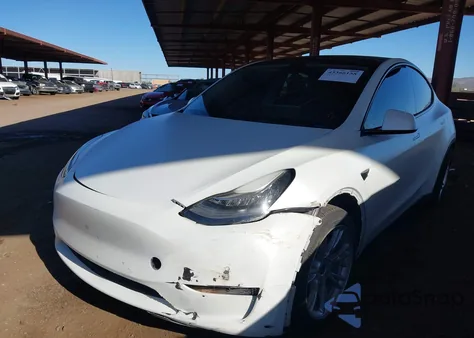 2022 Tesla Model Y Long Range Dual Motor All-Wheel Drive z USA, uszkodzony, nr VIN 7SAYGDEE8NA012383